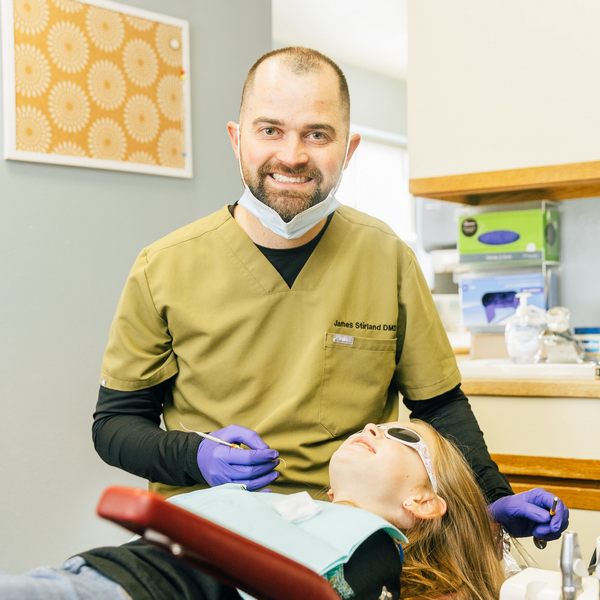 Meet Dr. James Stirland with his happy patient both smiling